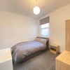 Photo 4: Double bedroom with wardrobe