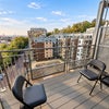 Photo 6: Private balcony with seating and open views across London
