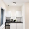 Photo 7: Fridge freezer, toaster, kettle, microwave
