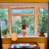 Photo 9: Window facing trees in a private road. 