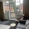 Photo 3: Lounge and Balcony
