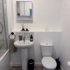 Photo 5: Modern shared bathroom