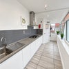 Photo 9: Communal Kitchen and Living Area
