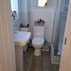 Photo 2: This is the ensuite. minus the bits and pieces in the picture
