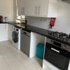 Photo 6: The kitchen