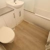 Photo 8: common bathroom