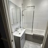 Photo 4: Bathroom with bath and shower