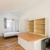 Photo 2: Bright and airy apartment with wall bed that can be folded into a cupboard.