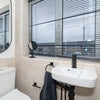 Photo 4: Bathroom - Cleaned Weekly