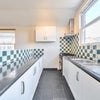 Photo 3:     Kitchen: Bright, modern open-plan kitchen