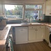 Photo 3: Range stove and oven in well served kitchen