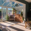 Photo 8: Unwinding on the sofa looking out into the garden and conservatory