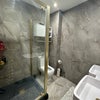 Photo 7: Communla shower/toilet