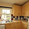Photo 5: Kitchen area