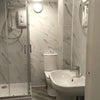 Photo 6: Down stairs bathroom