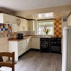 Photo 2: Kitchen and entrance to the back garden