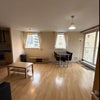 Photo 5: The living room- now decorated newly