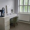 Photo 5: Desk/dressing table with small comfortable chair, a chest drawers and small coffee stand and fan