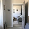 Photo 3: View from room to living area