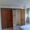 Photo 9: bedroom cupboard open