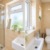 Photo 3: Private en-suite shower room with WC and basin