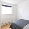 Photo 5: Bright Bedroom