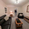 Photo 3: 43" smart TV will be included in the living room.
