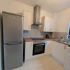 Photo 4: Full kitchen including cooker, microwave, kettle, toaster, fridge freezer, pots and pans, etc