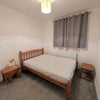 Photo 2: Room 2 is slightly smaller, double bed and built in wardrobe