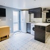 Photo 2: Open-plan kitchen lounge