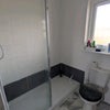 Photo 8: Toilet with shower