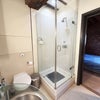 Photo 5: The bathroom: it has a shower AND a bathtub. 