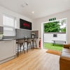Photo 2: Cook, relax and unwind—with the garden beyond