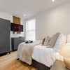 Photo 4: Fully furnished comfort with your own smart TV