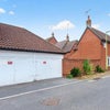 Photo 9: Double garage accessed from side of house