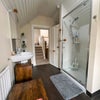 Photo 5: Double electric shower, WC and basin