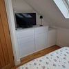 Photo 2: TV and chest of drs