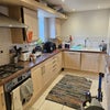 Photo 7: Kitchen with dishwasher and washing machine