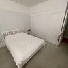 Photo 2: Wardrobe space and storage under the bed