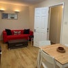 Photo 3: Living room with open plan kitchen diner