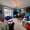 Photo 3: Living room with TV 