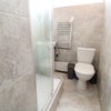 Photo 12: common bathroom