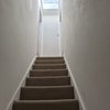 Photo 7: Stairs leading up to rooms