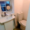 Photo 7: Private downstairs bathroom