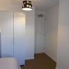 Photo 2: Furnished with comfy bed, drawers, wardrobe and desk