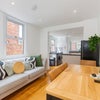 Photo 2: Sofa, dining table, TV