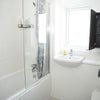 Photo 7: Upstairs bathroom with shower