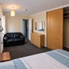 Photo 1: Queen size bed, built in wardrobe