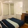 Photo 4: Downstairs Bedroom from the door entrance looking in
