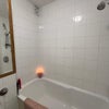 Photo 4: Shared bath
